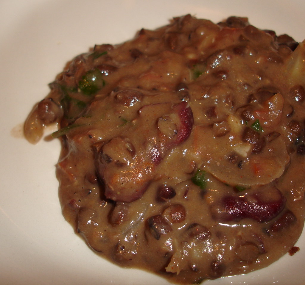 Creamy black dal makhani garnished with butter and cream