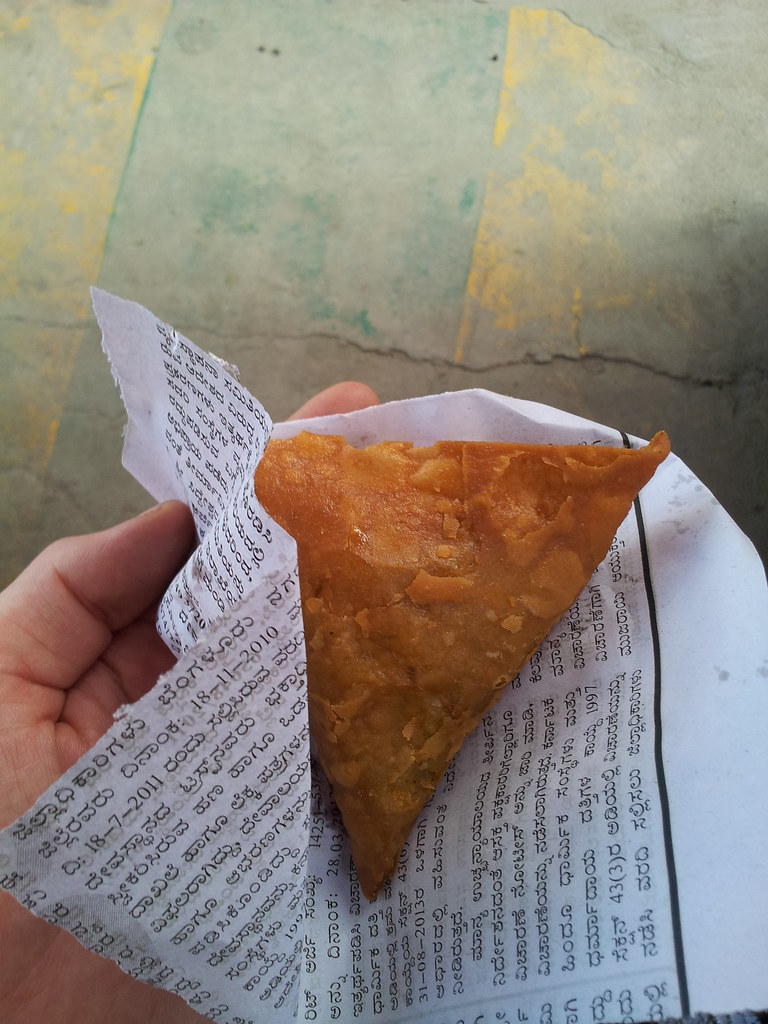 Crisp fried samosas served on a plate